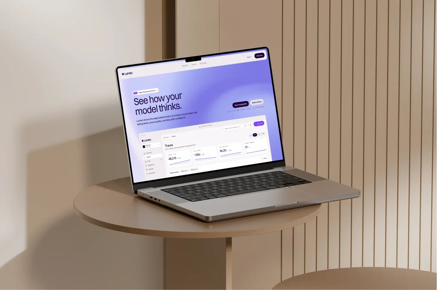 Lumen website on a laptop on a round wooden table