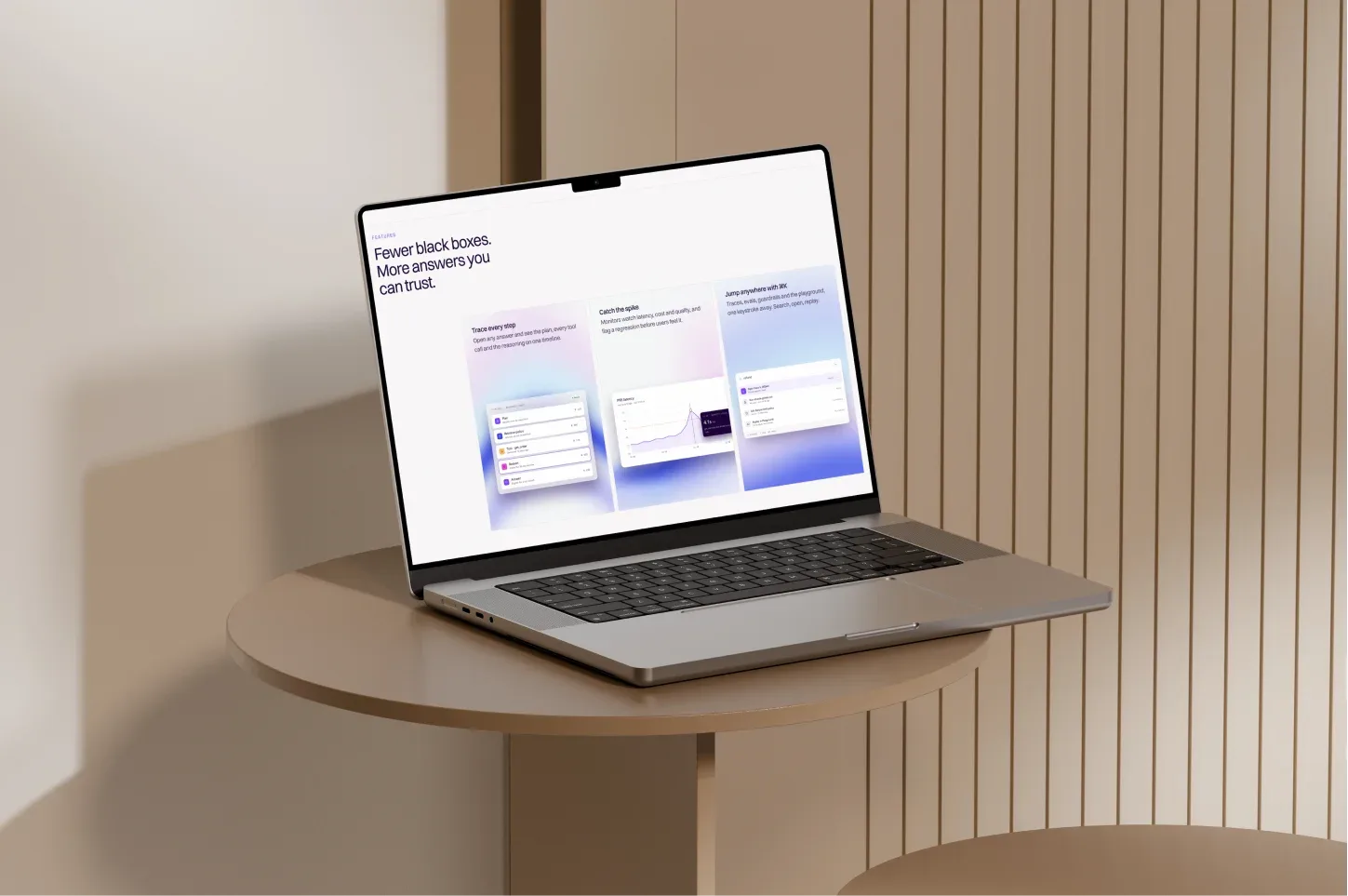 Lumen website on a laptop on a round wooden table