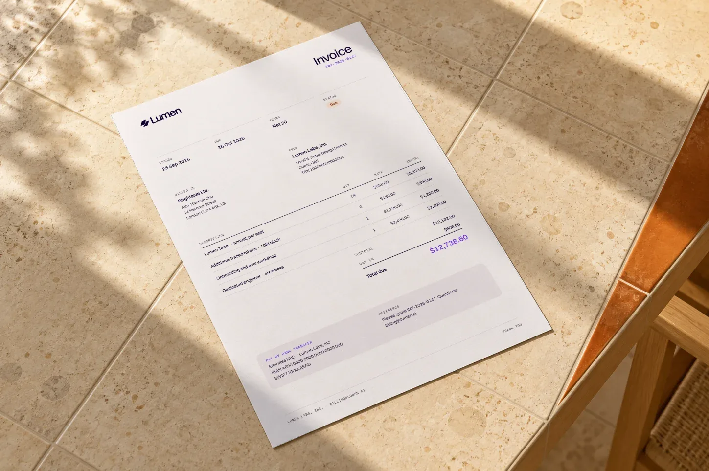 Lumen invoice on a stone floor